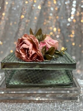 Green wire mesh basket with lavender flowers